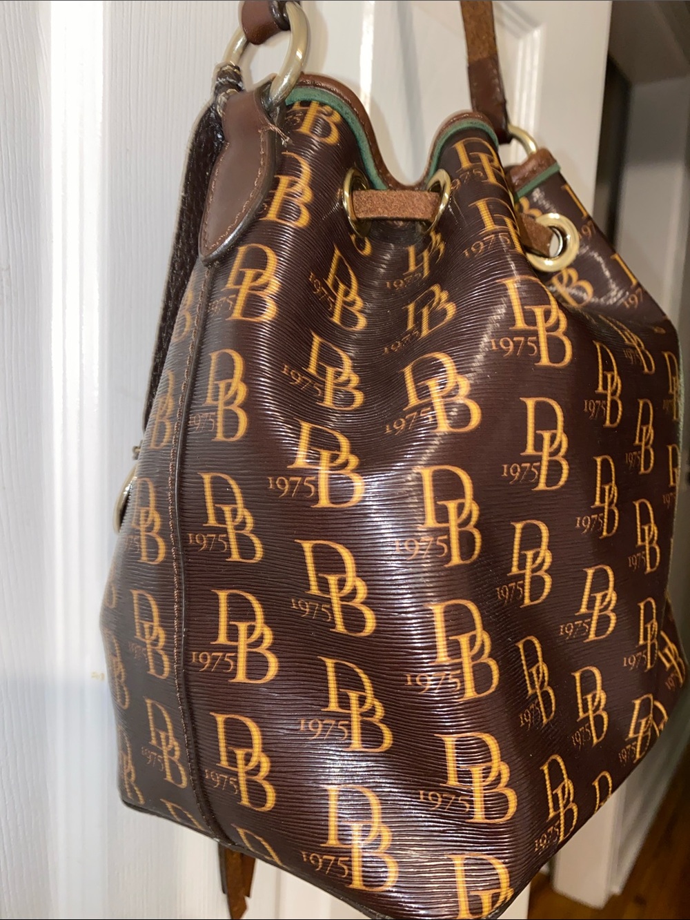 Dooney & Bourke Brown DB Monogram Braided Drawstring Bucket Bag - Picture 9 of 12